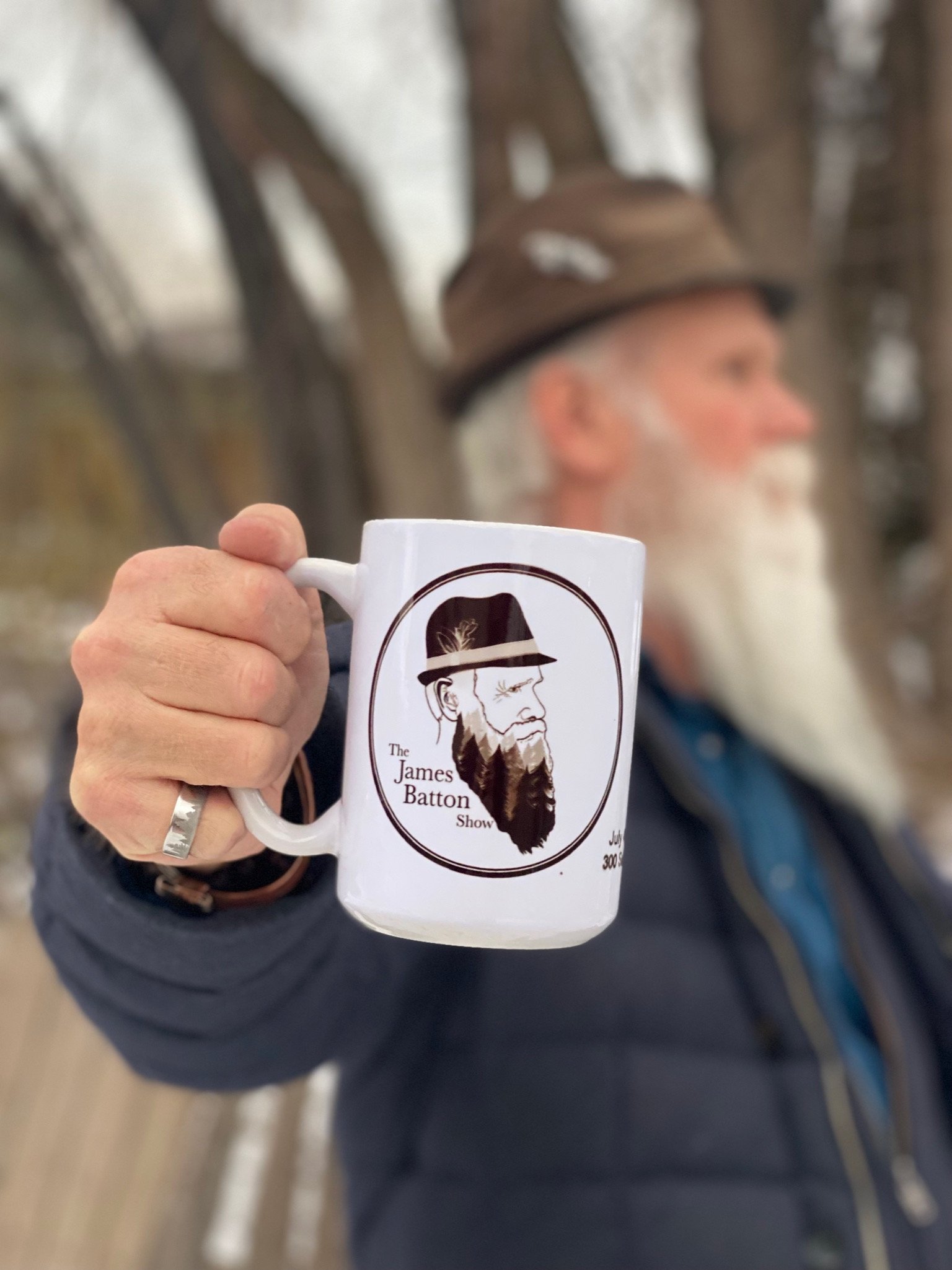 James Batton holding his signature coffee mug
